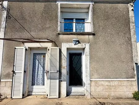 maison à rénover +terrain constructible + garages