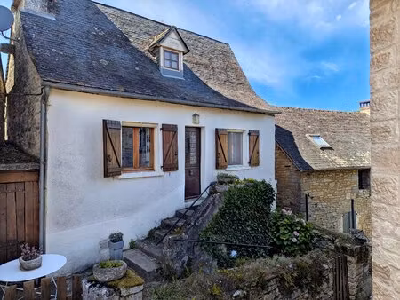 maison de village en pierre avec 3 chambres  garage double  cave et terrasses