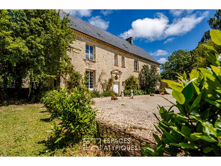 ancien manoir dans un écrin de verdure