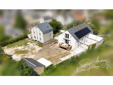 propriété polyvalente aux prestations énergétiques remarquables ? maison principale et log