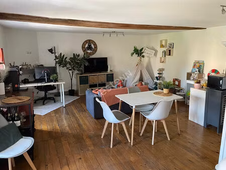local professionnel + appartements : le bien idéal pour investir ou développer votre activ
