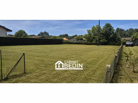 terrain 1165 m²