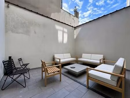 cinquantenaire - rdc 1 ch +/- 70 m² + cour