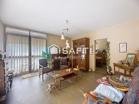 appartement 3 pièces de 58 m² à rénover avec balcon  cave et stationnement