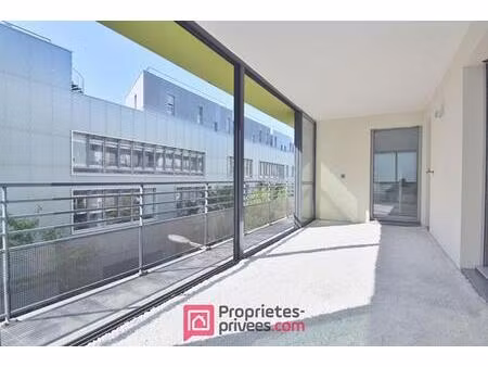 appartement 3 pièces 66 03 m² carrez avec 18 m² de jardin d'hiver et 8 m² de balcon filant