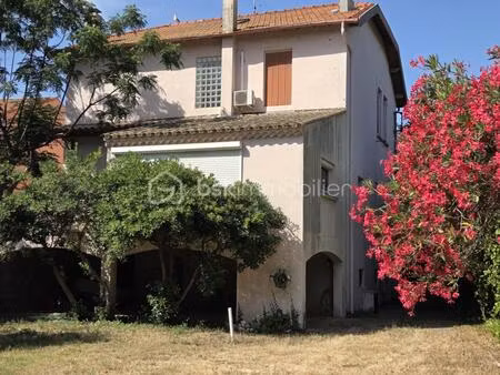 frontignan maison bourgeoise offrant 7 chambres  en plein coeur de ville