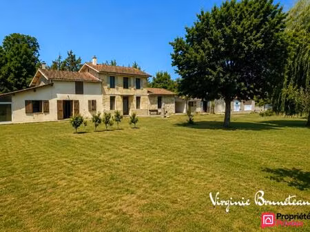 deux maisons indépendantes ? grand garage 90 m² ? jardin arboré ? fort potentiel