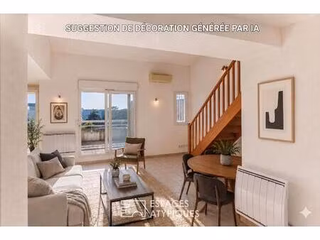 appartement lumineux de 112m2 avec terrasse  garage et mezzanine au coeur de montélimar
