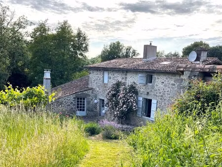 ancien moulin rénové avec terrain et dépendances – idéal résidence ou projet nature