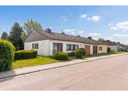 agréable maison 3 façades plain-pied à vendre sur un terrai