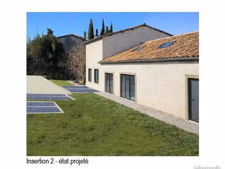 bien à destination d’activité ou d'habitation de 77 84 m2 + extérieur et parking  proche c