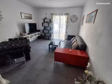 t3 traversant 64m2 avec balcon 1 étage 13004