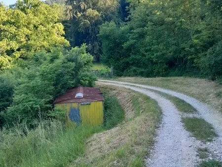 vente terrain avec abri de jardin cadastré