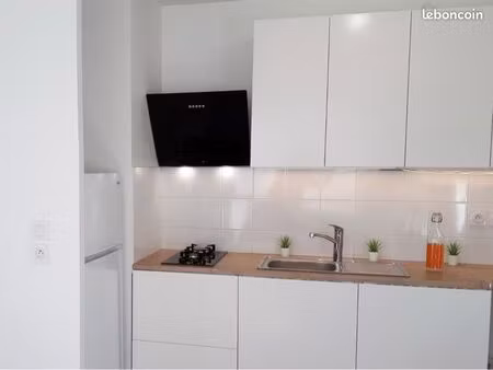 t2 à république avec balcon et garage au calme