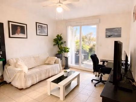 appartement t3 avec jardinet/terrasse  piscine résidentielle et 2 places de parking