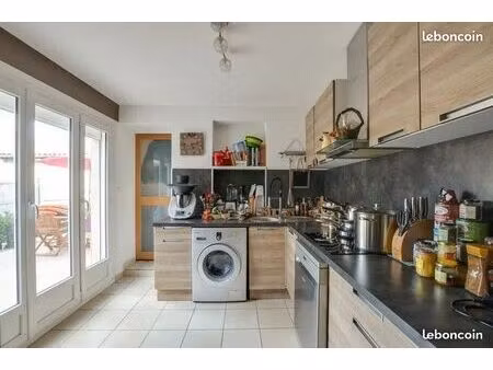 maison bourgeoise sur trois niveaux
