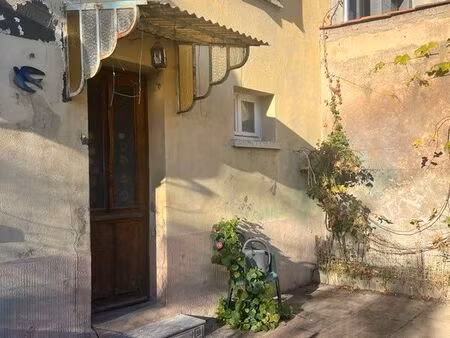 maison de bourg avec cour et jardin