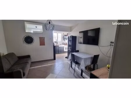appartement 2 pièces avec accès jardin  cave et 2 places de parking