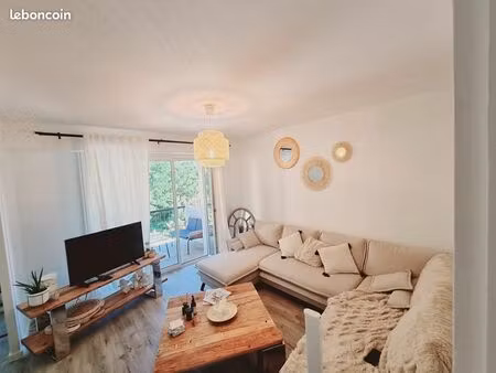 t4 avec 3 chambres  salon climatisé  un balcon et un garage