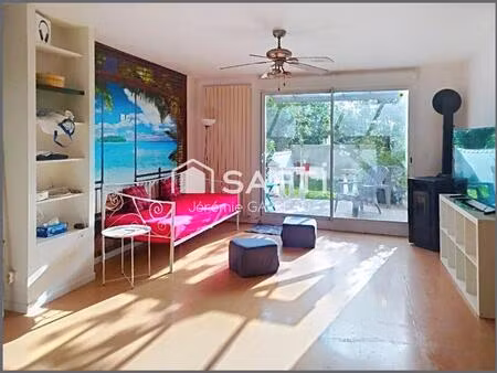 appartement de 82m2  en rdc avec terrasse et jardinet