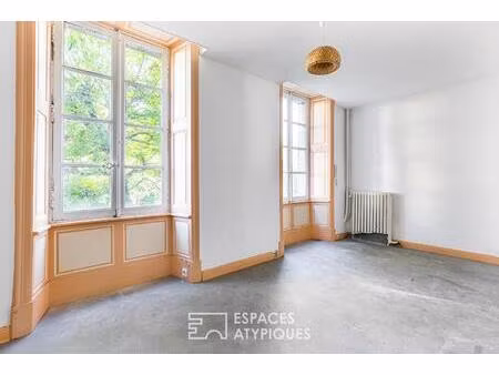 immeuble art déco avec jardin et garage en coeur de ville