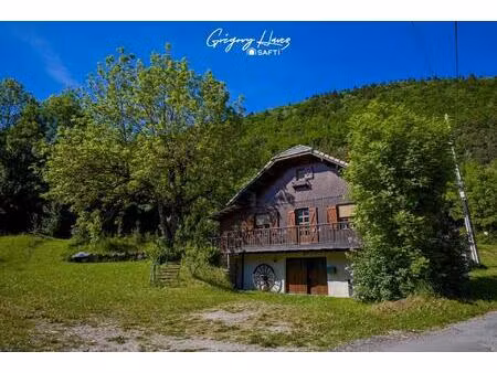 chalet avec terrain  garage et abris bois