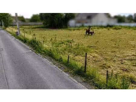 terrain à bâtir de 2906 m² et 80 m de façade