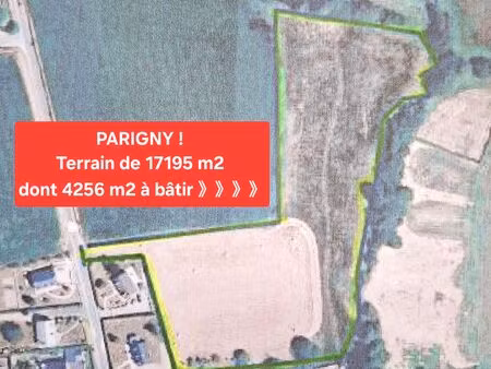 terrain a batir de 4256 m2 sur une parcelle totale de 17000 m2 environ a parigny 50600