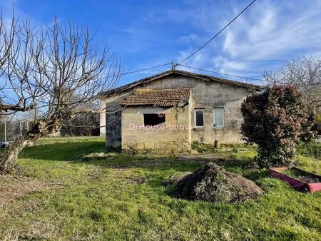 terrain constructible avec bâti de 64m2