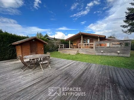 maison en bois rénovée avec terrasses et vue