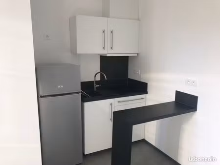 studio dans residence + place parking