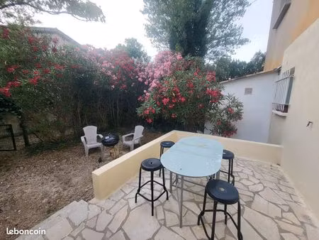 t2 rez de jardin + 2 places de parking