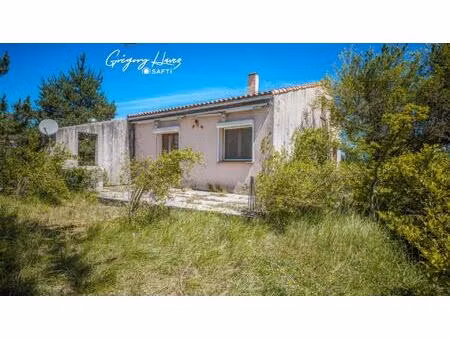 maison à rénover avec garage et terrain
