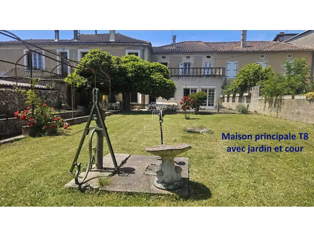 ensemble immobilier composee de 2 maisons individuelles et 2 appartements - secteur eauze