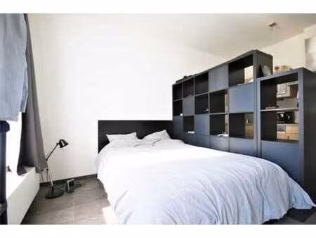studio et parking dans un immeuble de standing dans le centr