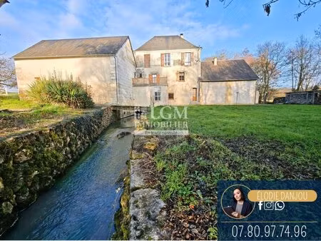 ancien moulin réhabilité de 150m² + maison de 100m² sur plus de 21 000m² de prairies et...