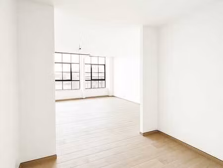 studio au style loft dans un bâtiment historique