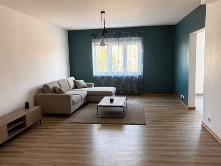 f3 92 m² en rez-de-chaussée – parking privé – centre-ville pouxeux