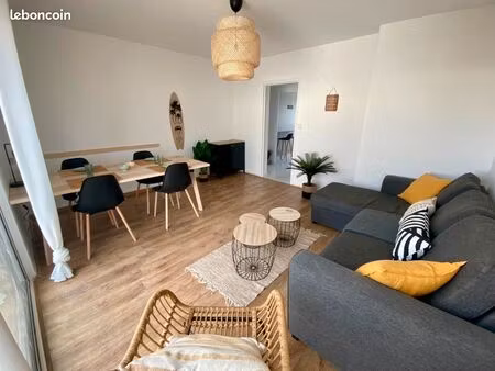 appartement 90 m² · 4 chambres · balcon