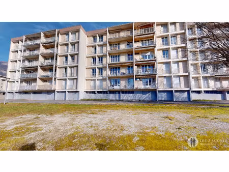 appartement t3 de 66m² avec balcon + cave loué en 4 chambres 1600€
