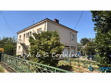 immeuble 2 appartements + terrain constructible