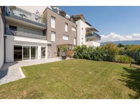 magnifique t3 en rez-de-jardin / place de parking / cave / garage en sus