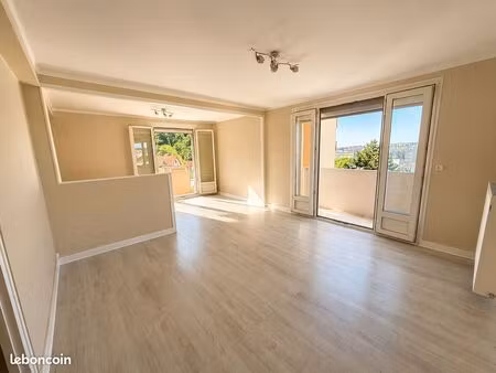 appartement t4 traversant - 2 balcons - garage - cave
