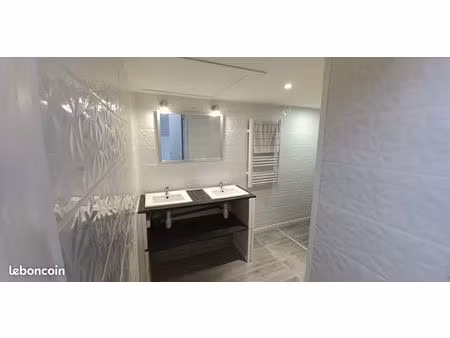 appartement f2 climatisé  avec possibilité parking et jardinée
