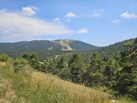 terrain constructible de 848 m² env. avec vue panoramique sur la moulière.