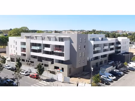 t4 neuf avec terrasse est - sud  cellier et double parkings privés sécurisés dans résidenc