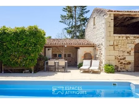 propriété avec piscine et dépendance aux multiples possibilités d'aménagement