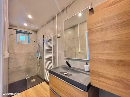 à vendre-appartement proche du centre ville en rdc surélevé