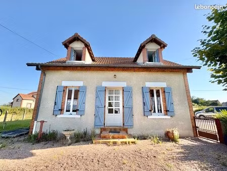maison avec garages et terrain