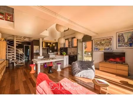 loft duplex avec loggia et jardin  dans un ancien batiment portuaire